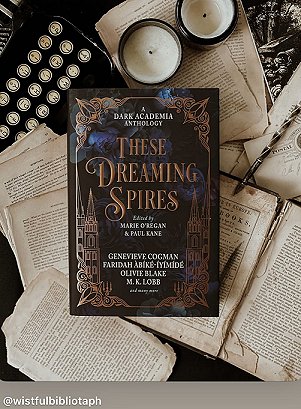 screenshot from @wistfulbibliotaph showing a copy of These Dreaming Spires edited by Marie O'Regan and Paul Kane, lying on a bed of pages taken from an open book to the righthand side