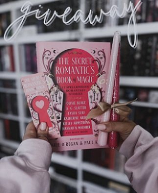 photograph of a woman's hands holding up a copy of The Secret Romantic's Book of Magic, edited by Marie O'Regan and Paul Kane, a Secret Romantic's bookmark to the left, and two pink candles tied with gold ribbon to the right. Text reads: GIVEAWAY